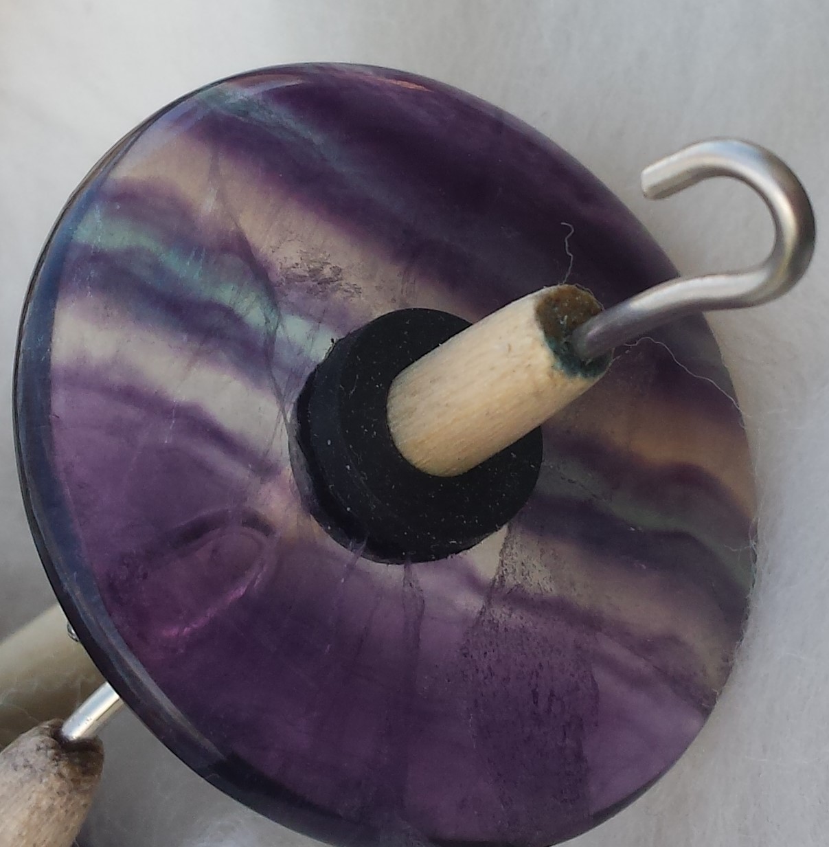 Drop Spindle Natural Fluorite Mineral - Purple with Green Bands - 1 9/16 inch (40 mm) 0.7 oz (20 g) Drop Spindle Natural Fluorite Mineral - Purple with Green Bands - 1 9/16 inch (40 mm) 0.7 oz (20 g)