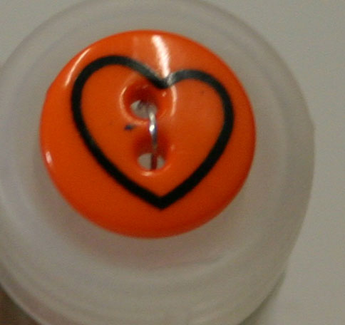 #211632 13mm (1/2 inch) Round Novelty Button by Dill - Orange Heart